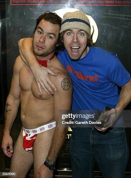 Semi-naked Chris Pontius and Party Boy attend the film premiere of "Jackass: The Movie" in London on February 25, 2003. Based on the cult MTV show,...