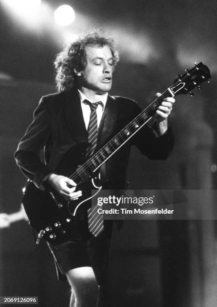 Angus Young of AC/DC performs at Shoreline Amphitheatre on August 15, 1996 in Mountain View, California.