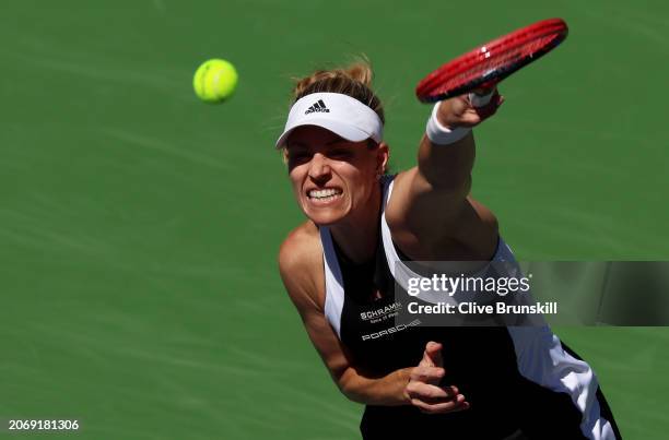 Angelique Kerber of Germany serves against Jelena Ostapenko of Latvia in their second round match during the BNP Paribas Open at Indian Wells Tennis...