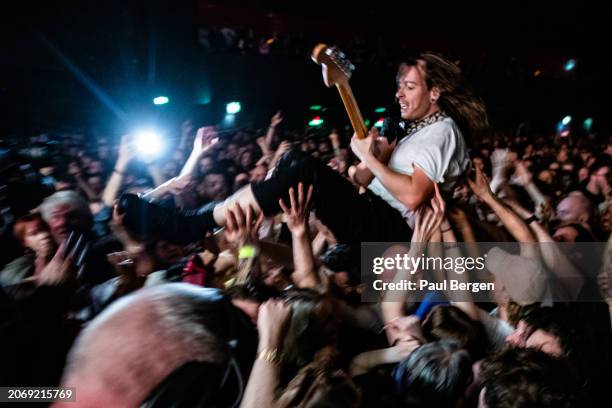 Lee Kiernan of Idles performs live on stage at Afas Live on March 8, 2024 in Amsterdam, Netherlands.