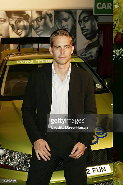 Actor Paul Walker attends the party for the premiere of 2 Fast 2 Furious at the Poland Street car park on June 9, 2003 in London.