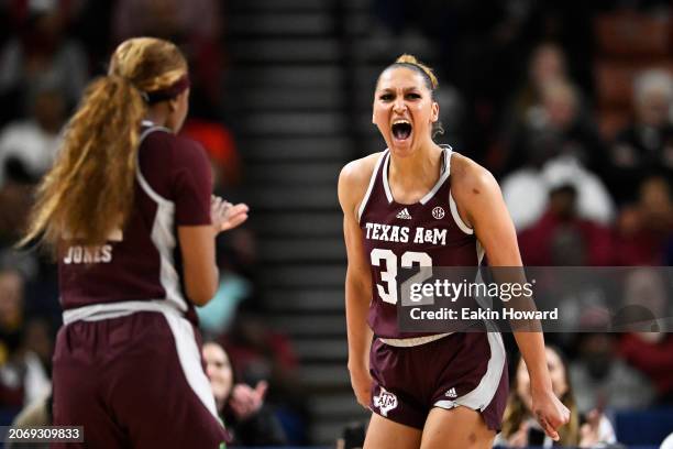 Lauren Ware of the Texas A&M Aggies celebrates her basket and foul against the South Carolina Gamecocks in the third quarter during the quarterfinals...