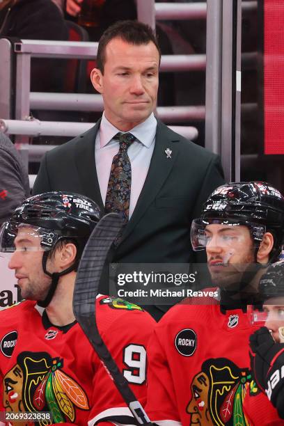 Head coach Luke Richardson of the Chicago Blackhawks looks on against the Colorado Avalanche during the second period at the United Center on...