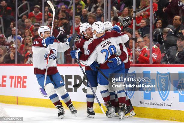 Zach Parise of the Colorado Avalanche celebrates with teammates after scoring against the Chicago Blackhawks during the first period at the United...