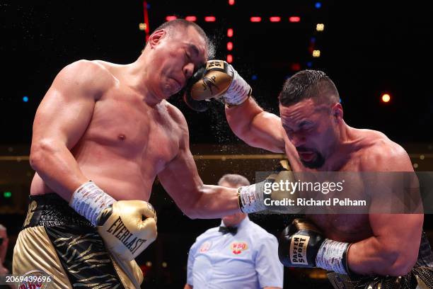 Zhilei Zhang and Joseph Parker exchange punches during the WBO Interim World Heavyweight title fight between Zhilei Zhang and Joseph Parker on the...