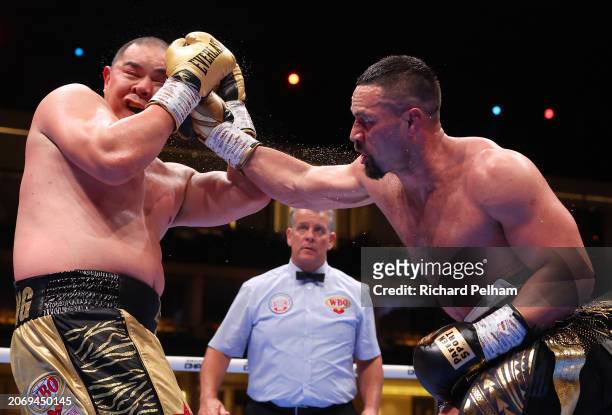 Joseph Parker punches Zhilei Zhang during the WBO Interim World Heavyweight title fight between Zhilei Zhang and Joseph Parker on the Knockout Chaos...