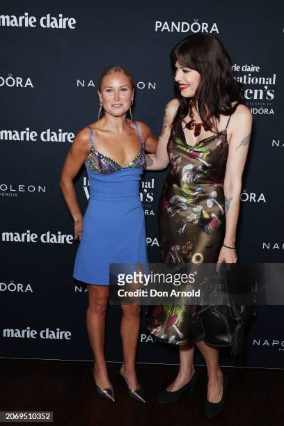 Grace Tame and Tara Moss pose during the Marie Claire 2024 International Women's Day Luncheon at Hinchcliff House on March 08, 2024 in Sydney,...