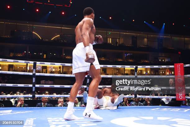 Francis Ngannou is knocked down by Anthony Joshua during the Heavyweight fight between Anthony Joshua and Francis Ngannou on the Knockout Chaos...