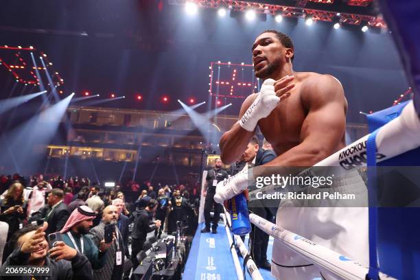 Anthony Joshua interacts with fans as he celebrates victory after the Heavyweight fight between Anthony Joshua and Francis Ngannou on the Knockout...