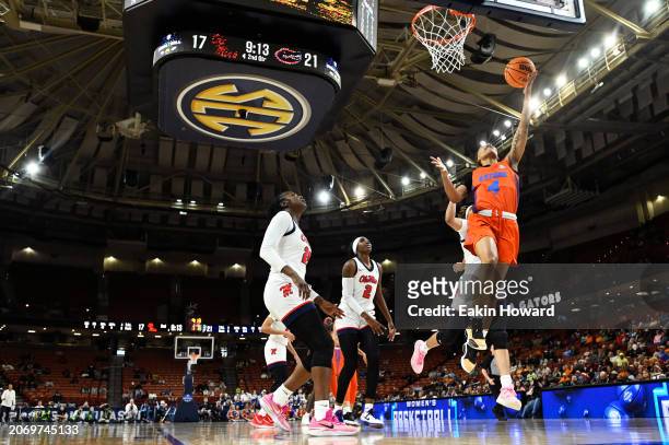 Zippy Broughton of the Florida Gators attempts a basket against the Ole Miss Rebels in the second quarter during the quarterfinals of the SEC Women's...