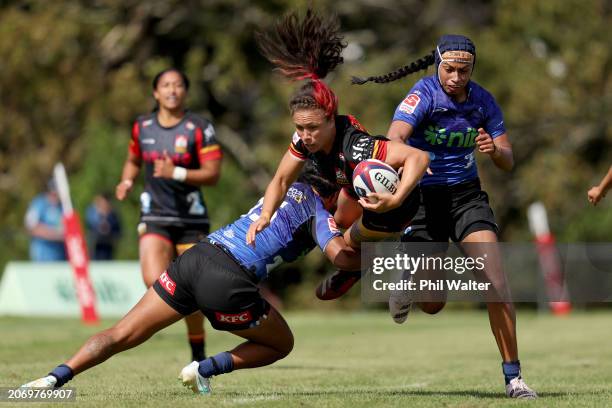 Ruby Tui of the Chiefs Manawa is tackled during the round two Super Rugby Aupiki match between Blues and Chiefs Manawa at Bell Park on March 09, 2024...