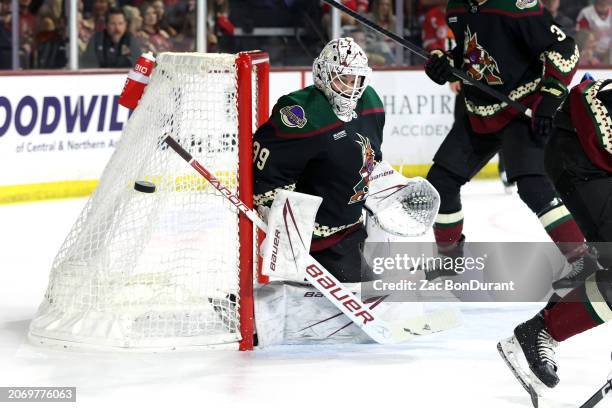 Connor Ingram of the Arizona Coyotes makes a save against the Detroit Red Wings during the first period at Mullett Arena on March 08, 2024 in Tempe,...