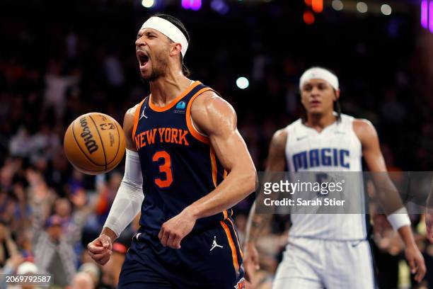 Josh Hart of the New York Knicks reacts after scoring during the second half against the Orlando Magic at Madison Square Garden on March 08, 2024 in...