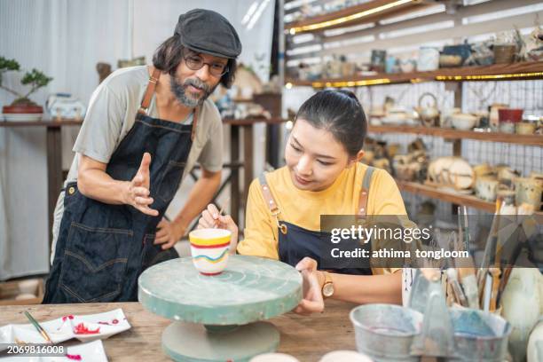 ceramic workshop at the pottery studio. - east asian works of art specialist stock pictures, royalty-free photos & images