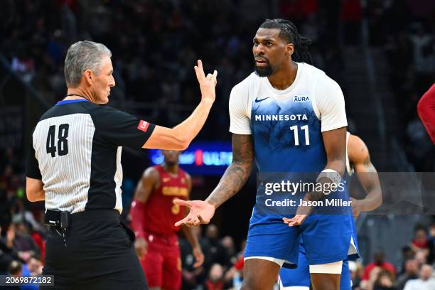 Referee Scott Foster calls a foul on Naz Reid of the Minnesota Timberwolves during the fourth quarter against the Cleveland Cavaliersat Rocket...