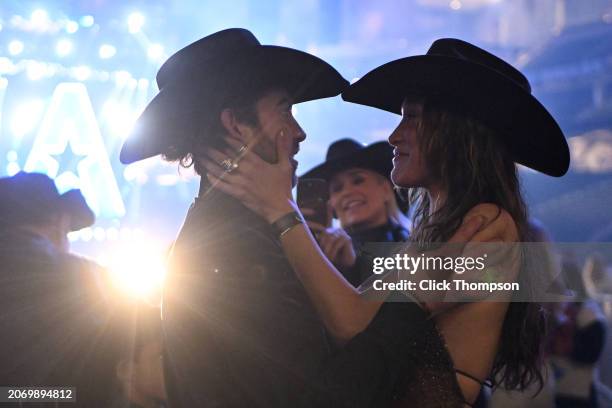 Adan Banuelos and Bella Hadid attend The American Performance Horseman by Teton Ridge at Globe Life Field on March 08, 2024 in Arlington, Texas.