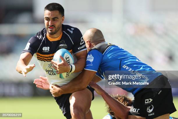 Tom Wright of the Brumbies is tackled during the round three Super Rugby Pacific match between ACT Brumbies and Western Force at , on March 09 in...