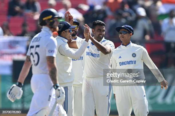 Ravichandran Ashwin of India celebrates bowling England captain Ben Stokes during day three of the 5th Test Match between India and England at...