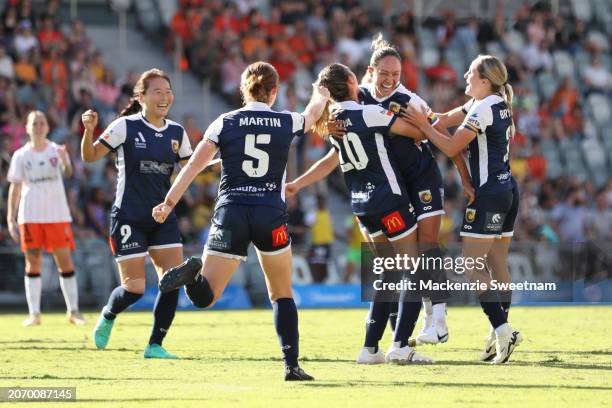 The Central Coast Mariners celebrate a goal during the A-League Women round 19 match between Brisb ane Roar and Central Coast Mariners at Ballymore...