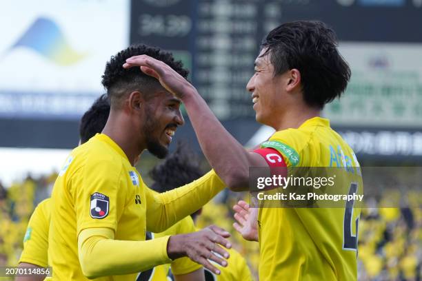 Taiyo Koga of Kashiwa Reysol celebrates with Diego after scoring their first goal during the J.LEAGUE MEIJI YASUDA J1 3rd Sec. Match between Júbilo...