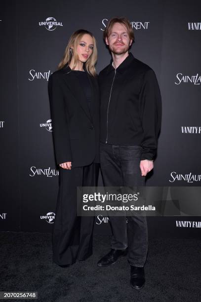 Claudia Sulewski and FINNEAS attend the Saint Laurent x Vanity Fair x NBCUniversal dinner and party to celebrate “Oppenheimer” at a private residence...