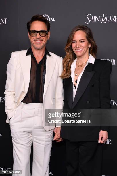 Robert Downey Jr. And Susan Downey attend the Saint Laurent x Vanity Fair x NBCUniversal dinner and party to celebrate “Oppenheimer” at a private...