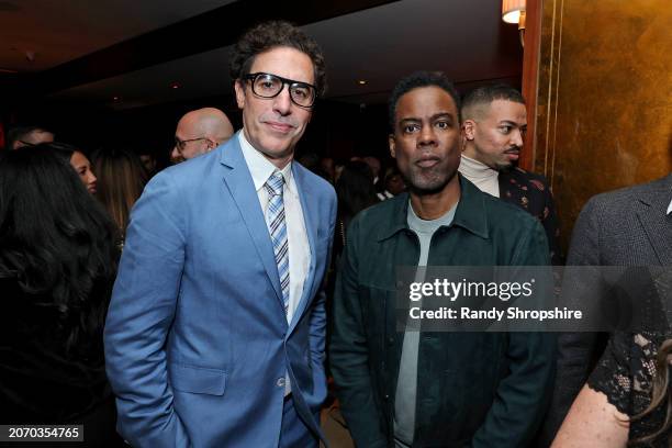 Sacha Baron Cohen and Chris Rock attend the CAA pre-Oscar party at Sunset Tower Hotel on March 08, 2024 in Los Angeles, California.