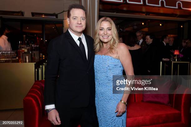 Brendan Fraser and Jeanne Moore attend the CAA pre-Oscar party at Sunset Tower Hotel on March 08, 2024 in Los Angeles, California.