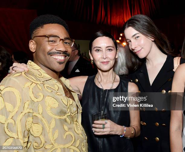 Donald Glover, Carmen Cuba, Danielle Haim attend the CAA pre-Oscar party at Sunset Tower Hotel on March 08, 2024 in Los Angeles, California.