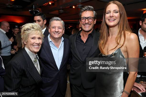 Diana Nyad, Ted Sarandos, Jon Hamm, and Anna Osceola attend the CAA pre-Oscar party at Sunset Tower Hotel on March 08, 2024 in Los Angeles,...