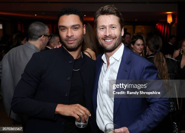 Regé-Jean Page and Glen Powell attend the CAA pre-Oscar party at Sunset Tower Hotel on March 08, 2024 in Los Angeles, California.