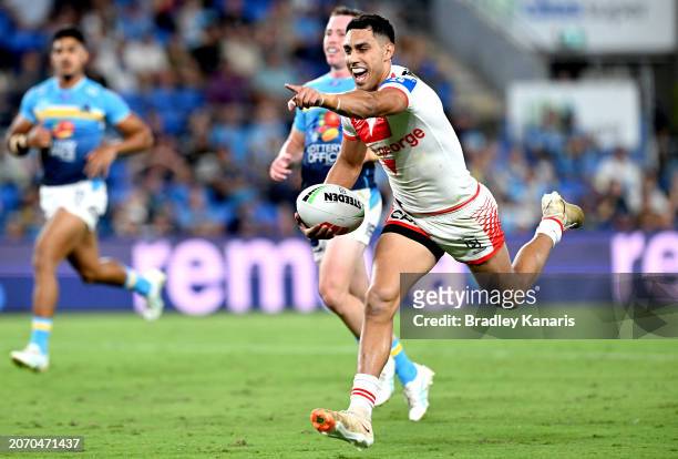 Tyrell Sloan of the Dragons celebrates after scoring a try during the round one NRL match between the Gold Coast Titans and St George Illawarra...