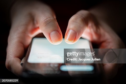 Fingers tapping smartphone screen Fingers tapping smartphone screen