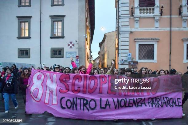 Women take part in a protest during the International Women's Day March organised by the Italian movement 'Non una di meno' in Piazza dei Cavalieri...