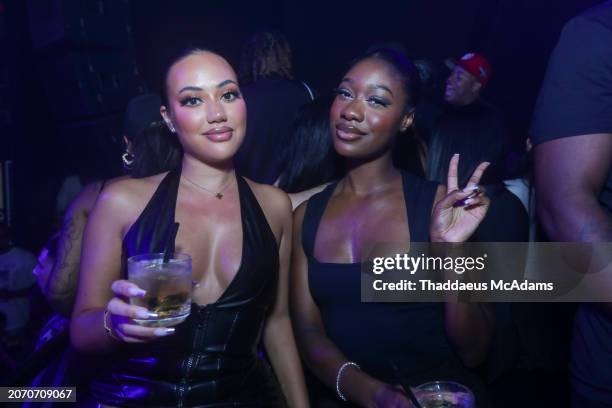 Girls pose for a picture at LIV Nightclub at Fontainebleau Miami on March 9, 2024 in Miami Beach, Florida.