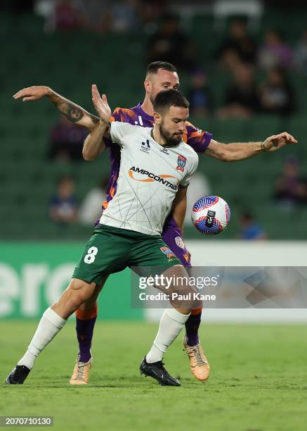 Apostolos Stamatelopoulos of the Jets and Aleksandar Susnjar of the Glory contest for the ball during the A-League Men round 20 match between Perth...