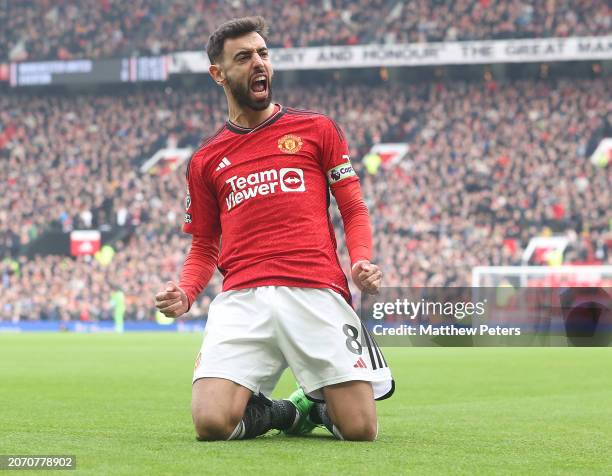 Bruno Fernandes of Manchester United celebrates scoring their first goal during the Premier League match between Manchester United and Everton FC at...