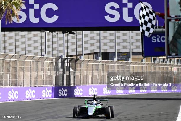 Race winner Doriane Pin of France and PREMA Racing takes the chequered flag during Round 1 Jeddah race 2 of the F1 Academy at Jeddah Corniche Circuit...