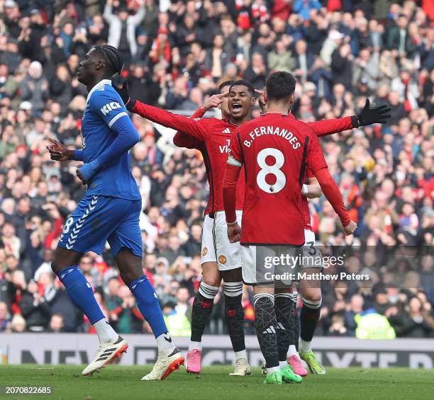 Marcus Rashford of Manchester United celebrates scoring their second goal during the Premier League match between Manchester United and Everton FC at...