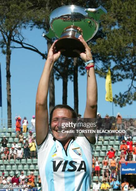 Argentine captain Karina Masotta displays her country's first ever World Cup after winning the Women's Hockey World Cup final in Perth, 08 December...