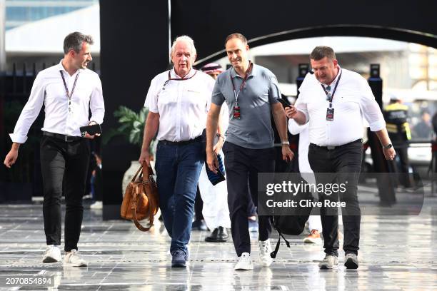 Oracle Red Bull Racing Team Consultant Dr Helmut Marko and Oliver Mintzlaff, Managing Director of Red Bull GmbH walk in the Paddock prior to the F1...