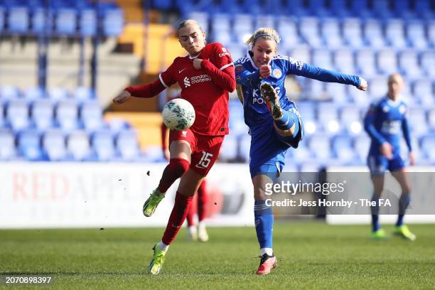 Lena Petermann of Leicester City is challenged by Sofie Lundgaard of Liverpool during the Adobe Women's FA Cup Quarter Final match between Liverpool...