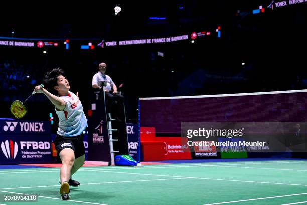 Akane Yamaguchi of Japan plays a forehand during her Women's single semi final match against Chen Yu Fei of China at the Yonex French open badminton...