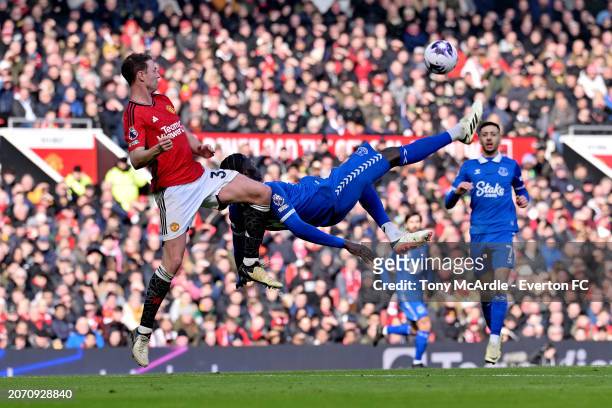 Amadou Onana of Everton with a chance on goal during the Premier League match between Manchester United and Everton FC at Old Trafford on March 09,...