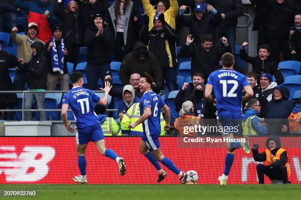 Callum O'Dowda of Cardiff City celebrates scoring his team's second goal with teammate Ryan Wintle during the Sky Bet Championship match between...