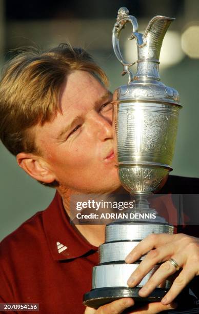 Ernie Els, of South Africa, kisses the Claret Jug after winning The 131st Open Championship at Muirfield, Scotland 21 July 2002. Els won after an...