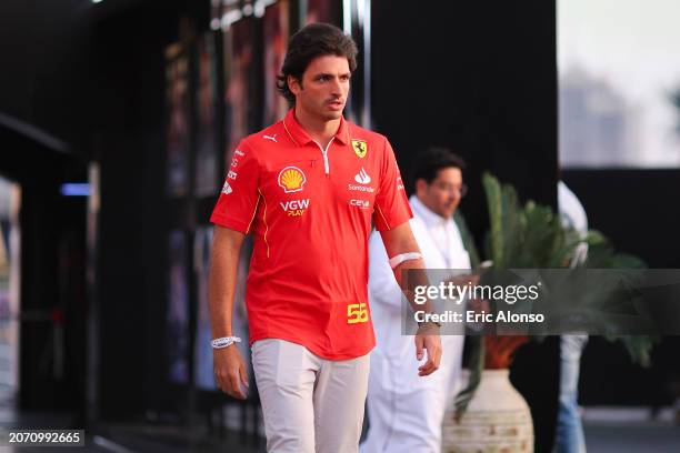 Carlos Sainz of Spain and Scuderia Ferrari walks int he paddock prior to the F1 Grand Prix of Saudi Arabia at Jeddah Corniche Circuit on March 09,...