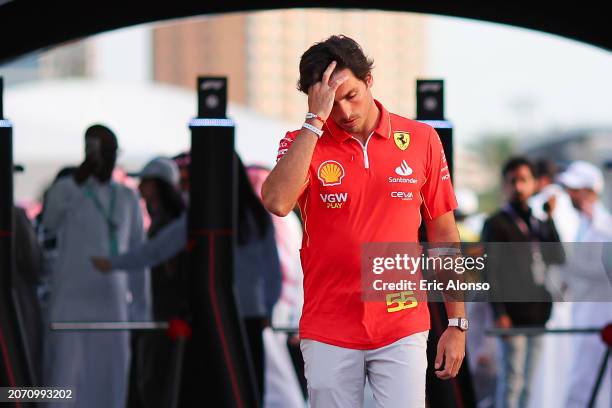 Carlos Sainz of Spain and Scuderia Ferrari walks int he paddock prior to the F1 Grand Prix of Saudi Arabia at Jeddah Corniche Circuit on March 09,...