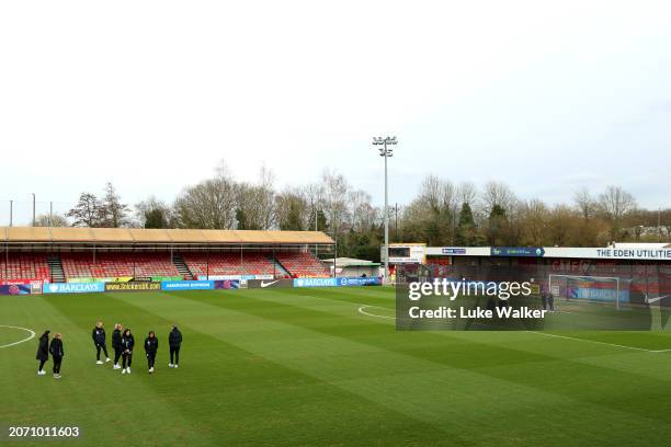 General view of Brighton & Hove Albion players inspecting the pitch during the Adobe Women's FA Cup Quarter Final match between Brighton & Hove...