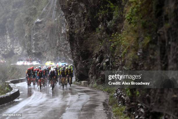 Otto Vergaerde of Belgium and Team Lidl - Trek, Nils Politt of Germany and UAE Team Emirates lead the peloton in heavy rain during the 82nd Paris -...